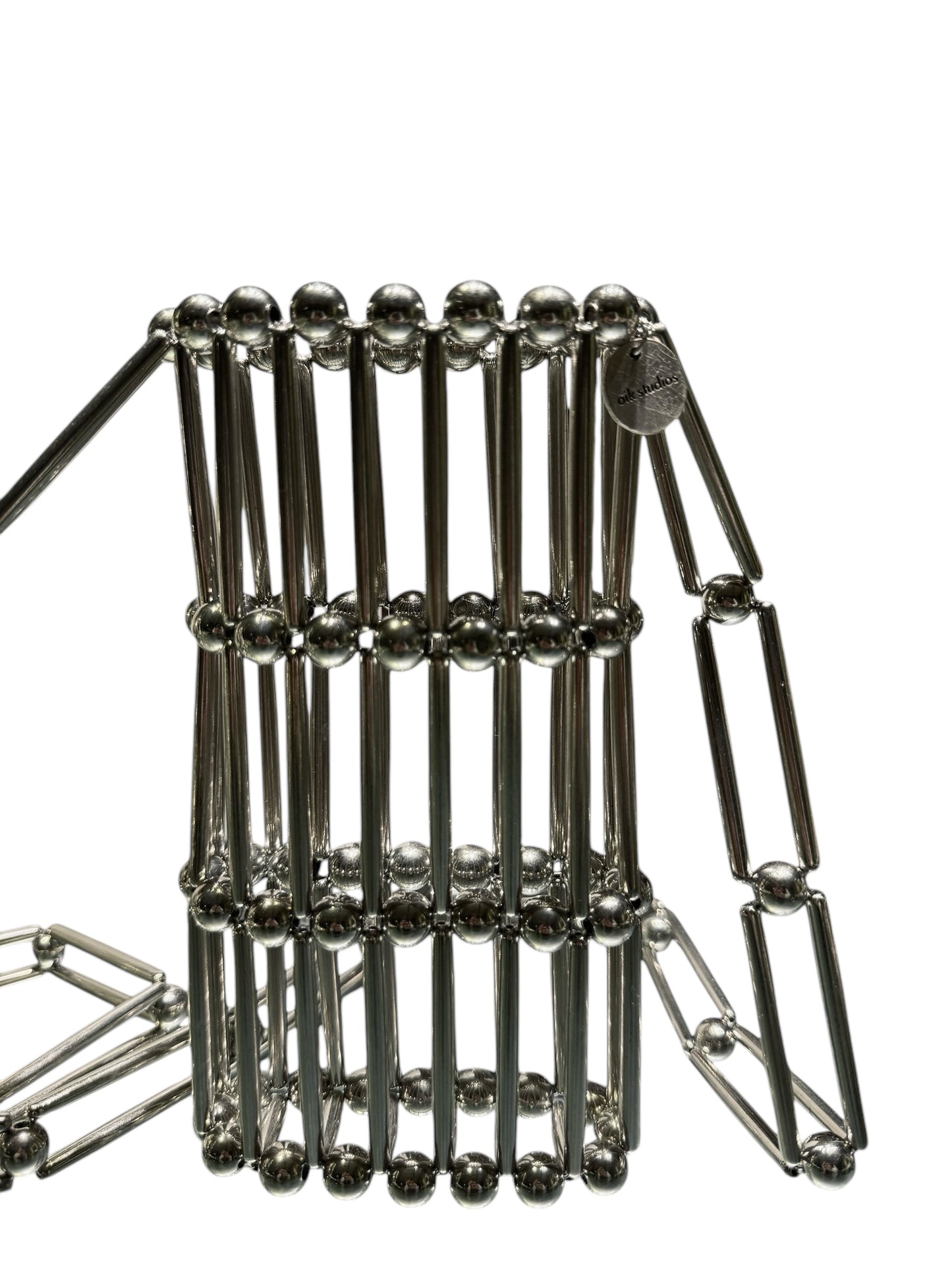 OIK STUDIOS SILVER STIX PHONE BAG