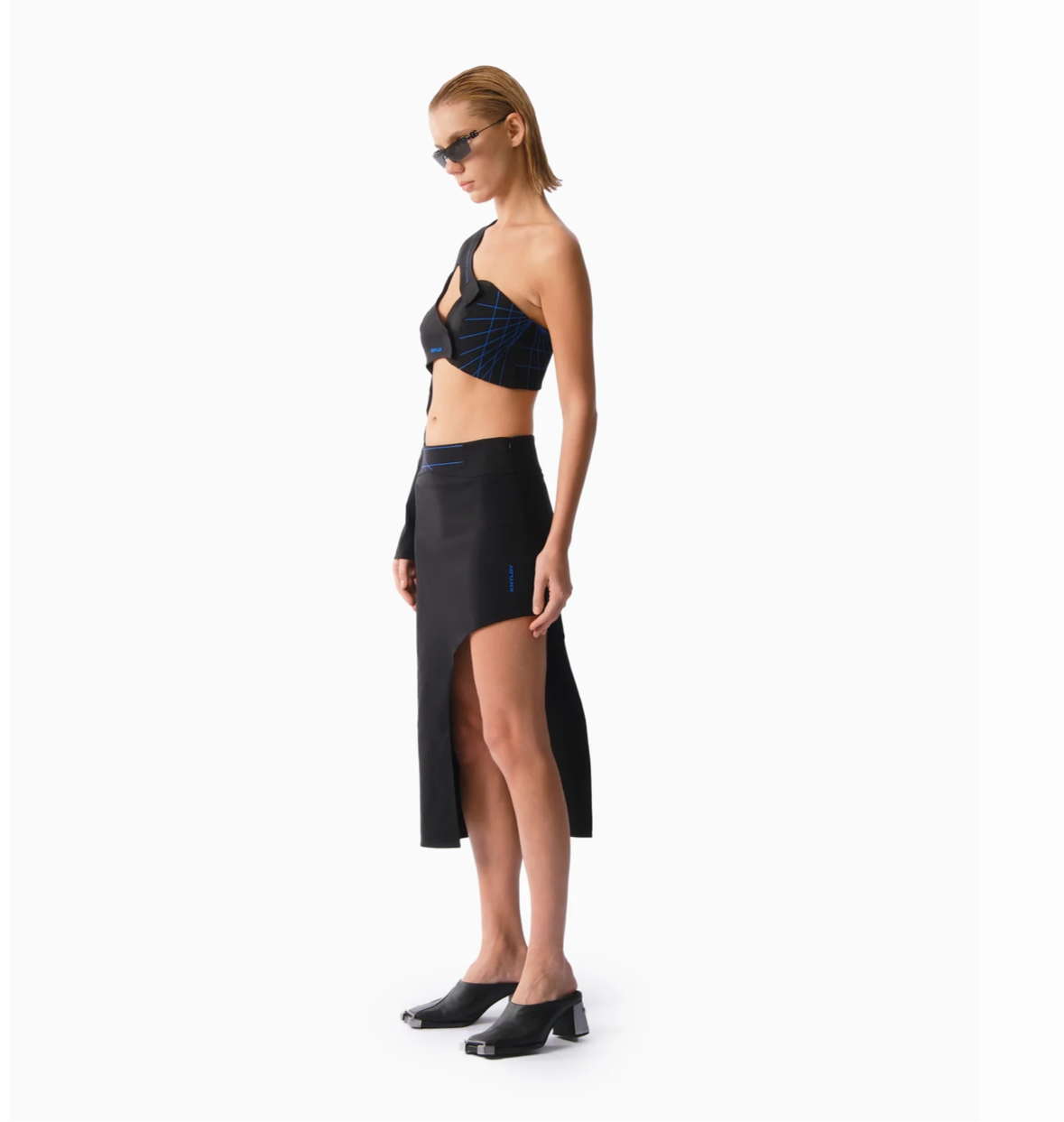 KNTLGY HEROINE ASYMMETRIC MIDI SKIRT